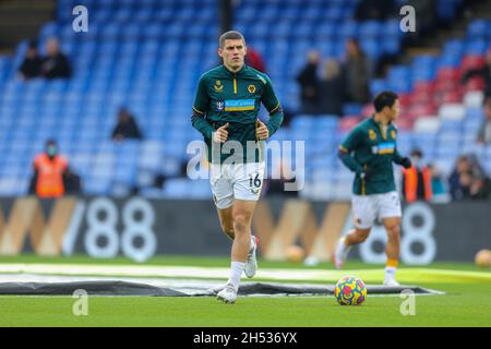 London, UK. London, UK. 06th Nov, 2021. 6th November 2021; Selhurst Park, Crystal Palace, London, England;  Premier League football, Crystal Palace versus Wolves: Conor Coady of Wolverhampton Wanderers coming out for the warm up, running towards the away fans to clip them for their support. Credit: Action Plus Sports Images/Alamy Live News Credit: Action Plus Sports Images/Alamy Live News Stock Photo