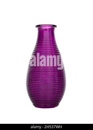 Ribbed purple glass vase isolated on white background. Stock Photo