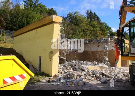 Demolition of a small warehouse Stock Photo