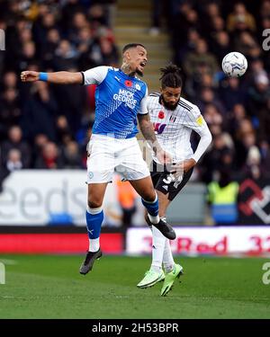 Peterborough United's Jonson Clarke-Harris (right) scores their side's ...