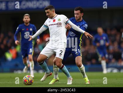 London, UK, 6th November 2021.  Ben Chilwell of Chelsea challenges Matthew Lowton of Burnley during the Premier League match at Stamford Bridge, London. Picture credit should read: Darren Staples / Sportimage Stock Photo