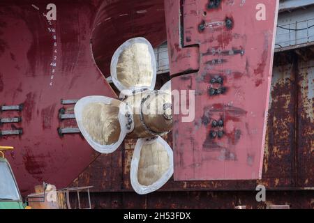 Repair of the ship screw in dock. Stock Photo