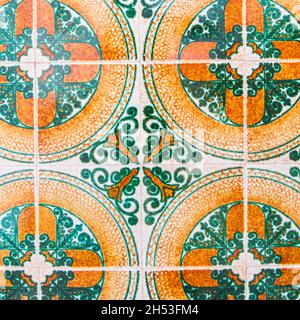 Closeup of a floral vintage pattern of tile in the wall Stock Photo