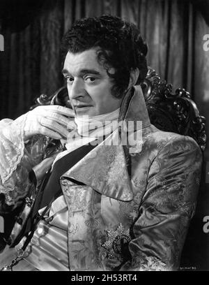 JACK HAWKINS Portrait as the Prince of Wales in THE ELUSIVE PIMPERNEL 1949 directed written and produced by MICHAEL POWELL and EMERIC PRESSBURGER novel The Scarlet Pimpernel by Baroness Orczy music Brian Easdale The Archers / London Film Productions Stock Photo