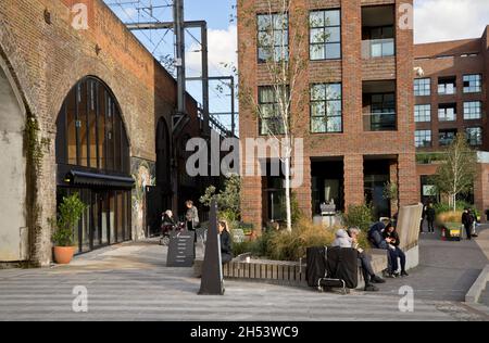 People walking around the new Hawley Wharf housing, shoping and offices development at Camden Lock market in London,England,UK Stock Photo