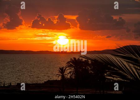 sunset over the sea in Can Pastilla Mallorca Spain Stock Photo