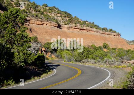 Two-lane road winding through Colorado National Monument Stock Photo