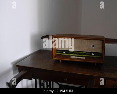 Old radio on table in hotel, Sibiu, Romania Stock Photo
