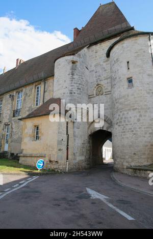 Fortified gate of the castle with a tower and a turret, Prémery, Nievre, Bourgogne-Franche-Comté, Central France Stock Photo