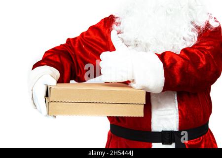 Pizza boxes in the hands of Santa Claus. Christmas fast food delivery.  New year's eve promotion. Isolated on white. Stock Photo