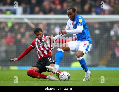 Blackburn, England, 6th November 2021.  Rhian Brewster of Sheffield Utd  tackles Ryan Nyambe of Blackburn Rovers  during the Sky Bet Championship match at Ewood Park, Blackburn. Picture credit should read: Simon Bellis / Sportimage Credit: Sportimage/Alamy Live News Stock Photo