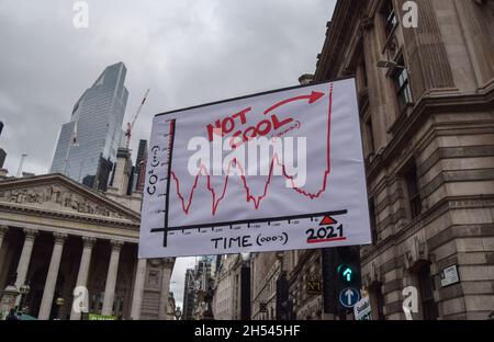 London, UK. 6th November 2021. Protesters outside the Bank of England. Thousands of people marched from the Bank of England to Trafalgar Square as part of the COP26 Coalition Global Day of Action For Climate Justice. Credit: Vuk Valcic / Alamy Live News