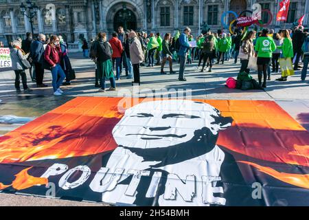 Paris, France, French NGO's, Climate Crisis Demonstration, Crwod Activists, OXFAM, Poutin Protest Sign, Putin image, global problem Stock Photo