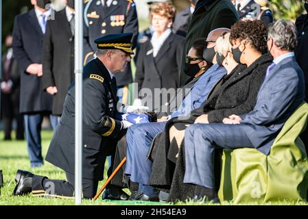 Arlington, United States. 05th Nov, 2021. U.S. General Mark Milley, Chairman of the Joint Chiefs of Staff, presents Alma Powell, wife of former U.S. Secretary of State Gen. Colin Powell, with the flag during the funeral service at Arlington National Cemetery, November 5, 2021 in Arlington, Virginia. Credit: Elizabeth Fraser/DOD Photo/Alamy Live News Stock Photo