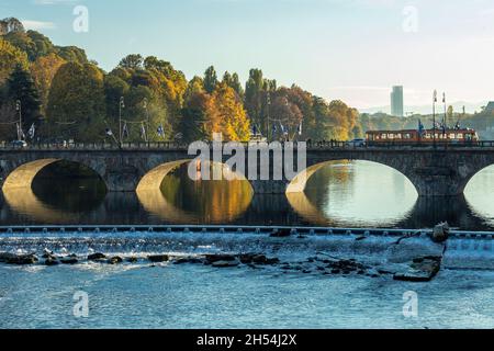 Autumn with yellow foliage along the Po river in Turin, Piedmont, Italy Stock Photo