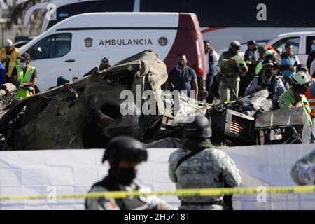 Emergency services personnel work the scene of a deadly accident involving a tractor-trailer on a tollway between Mexico City and Puebla, in Chalco, Mexico November 6, 2021. REUTERS/Luis Cortes