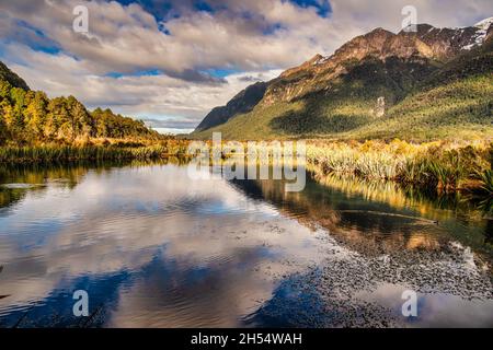 Mirror Lakes are a set of lakes lying north of Lake Te Anau and on the road from Te Anau to Milford Sound in New Zealand where the most amazing reflec Stock Photo