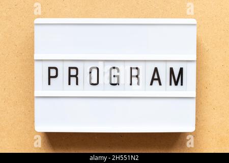 Lightbox with word program on wood background Stock Photo