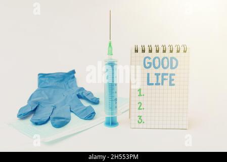 Hand writing sign Good Life. Word Written on living in comfort and luxury with few problems or worries Writing Important Medical Notes Laboratory Stock Photo