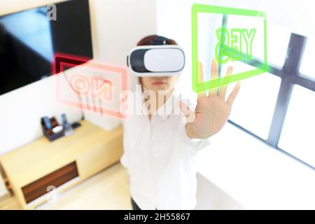 girl using the virtual reality glasses Stock Photo