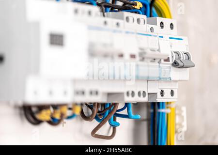 Voltage switchboard with circuit breakers, close up. Stock Photo