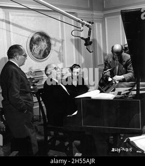 EMERIC PRESSBURGER SIR THOMAS BEECHAM LADY BEECHAM and MICHAEL POWELL candid during preliminary recording of the whole score for THE TALES OF HOFFMANN 1951 directed written and produced by MICHAEL POWELL and EMERIC PRESSBURGER music by Jacques Offenbach English libretto Dennis Arundell conductor Sir Thomas Beecham production design Hein Heckroth costume design Ivy Baker and Hein Heckroth choreographer Frederick Ashton The Archers / Vega Film Productions / British Lion Film Corporation Stock Photo