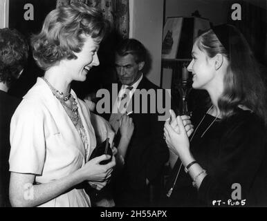 MOIRA SHEARER talks to GADULA BOEHM , wife of leading man Carl Boehm at a reception at the beginning of filming of PEEPING TOM 1960 director / producer MICHAEL POWELL original story / screenplay Leo Marks music Brian Easdale Michael Powell (Theatre) / Anglo-Amalgamated Film Distributors Stock Photo