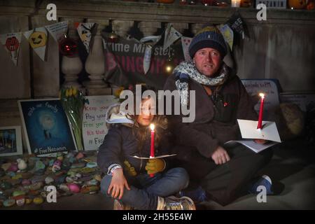 London, UK. 05th Nov, 2021. Richard Ratcliffe and daughter Gabriella hold a candlelit vigil outside the Foreign Office for their wife and mother Nazanin Zaghari-Ratcliffe who has been detained in Iran since 2016, jailed on charges of plotting to topple the Iranian government. (Photo by Martin Pope/SOPA Images/Sipa USA) Credit: Sipa USA/Alamy Live News Stock Photo