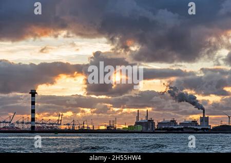 Hook of Holland, The Nethelrands, November 5, 2021: view across Nieuwe Waterweg canal towards Europoort and Maasvlakte industrial area shortly before Stock Photo