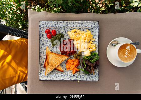 Served rustic breakfast with cappuccino coffee Stock Photo