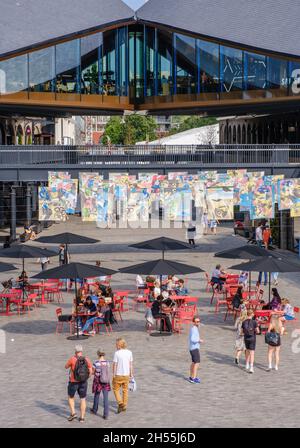 Coal Drops Yard, once a Victorian rail delivery depot, is restored into a vibrant, modern shopping & restaurant district, in King’s Cross, London. Stock Photo
