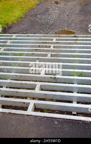 Cattle Grid on Road in Scotland Stock Photo