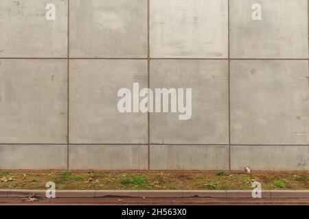 Gray concrete wall with lots of concrete shapes and grid lines Stock Photo
