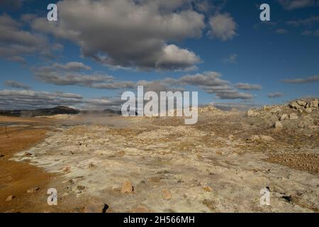 Geothermal area bubbling pools of mud steaming sulfuric gas Stock Photo