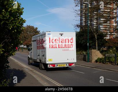 Logo of Iceland supermarket on a van seen driving in the street. Stock Photo