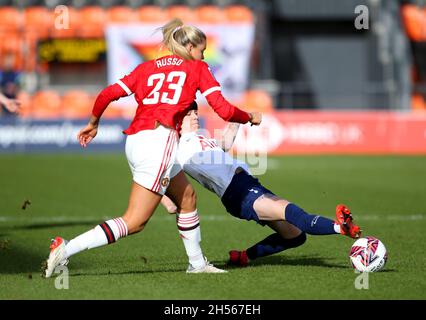 Manchester United's Alessia Russo (left) and Tottenham Hotspur's Ashleigh Neville battle for the ball during the Barclays FA Women's Super League match at The Hive, London. Picture date: Sunday November 7, 2021. Stock Photo