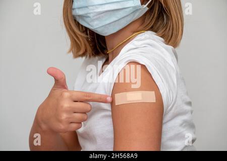 Children receiving vaccine at out side of the thigh.Children vaccine. Stock Photo