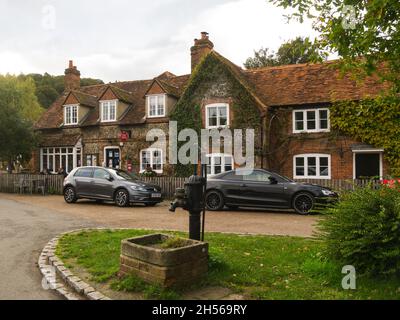 Water Pump in front of village Post Office and Store Hambleden Buckinghamshire England UK a village in the Chiltern Hills Stock Photo