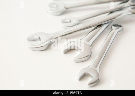 Old hand tools ,Pliers screwdriver wrench rusted iron metal tools on Steel plate at garage. Stock Photo