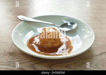 mashed potato dressing gravy sauce and silver spoon on plate Stock Photo