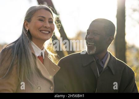 Storytelling image of a multiethnic senior couple in love Stock Photo