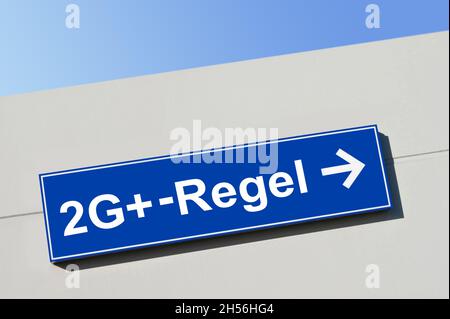 German Corona 2G+ Rule and blue sign Stock Photo