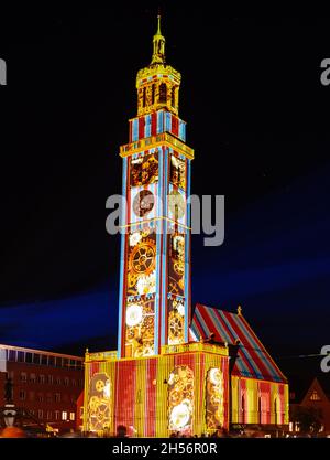 AUGSBURG, GERMANY - OCTOBER 24: Illuminated historic Perlach tower at the festival of lights in Augsburg, Germany on October 24, 2021 Stock Photo