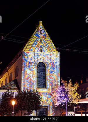 AUGSBURG, GERMANY - OCTOBER 24: Illuminated historic buildings at the festival of lights in Augsburg, Germany on October 24, 2021 Stock Photo