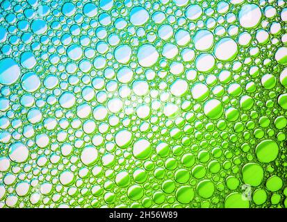 Abstract green bubbles texture. Foam bubbles macro background. Stock Photo