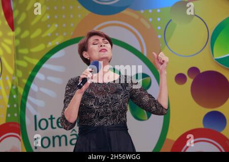 BUCHAREST, ROMANIA - October 24, 2021: Adriana Antoni, the folk singer of traditional Romanian music sings in the TV studio of Lottery. Stock Photo