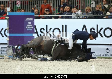 Verona, Italy. 07th Nov, 2021. CARLOS ENRIQUE LOPEZ LIZARAZO of Colombia riding ADMARA crashes during the jump-off of the FEI Jumping World Cup 2021 at the Pala Volkswagen on November 7th 2021 in Verona, Italy Credit: Mickael Chavet/Alamy Live News Stock Photo