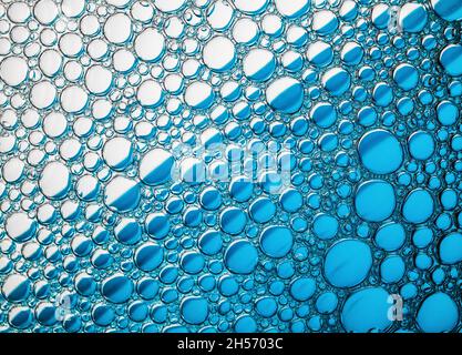 Blue bubbles macro texture. Foam bubbles background. Stock Photo