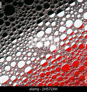 Abstract bubbles texture. Black, red and white background. Stock Photo
