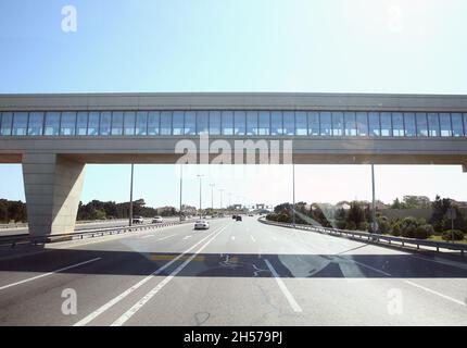 overground pedestrian crossing . Pedestrian bridge across the highway ...